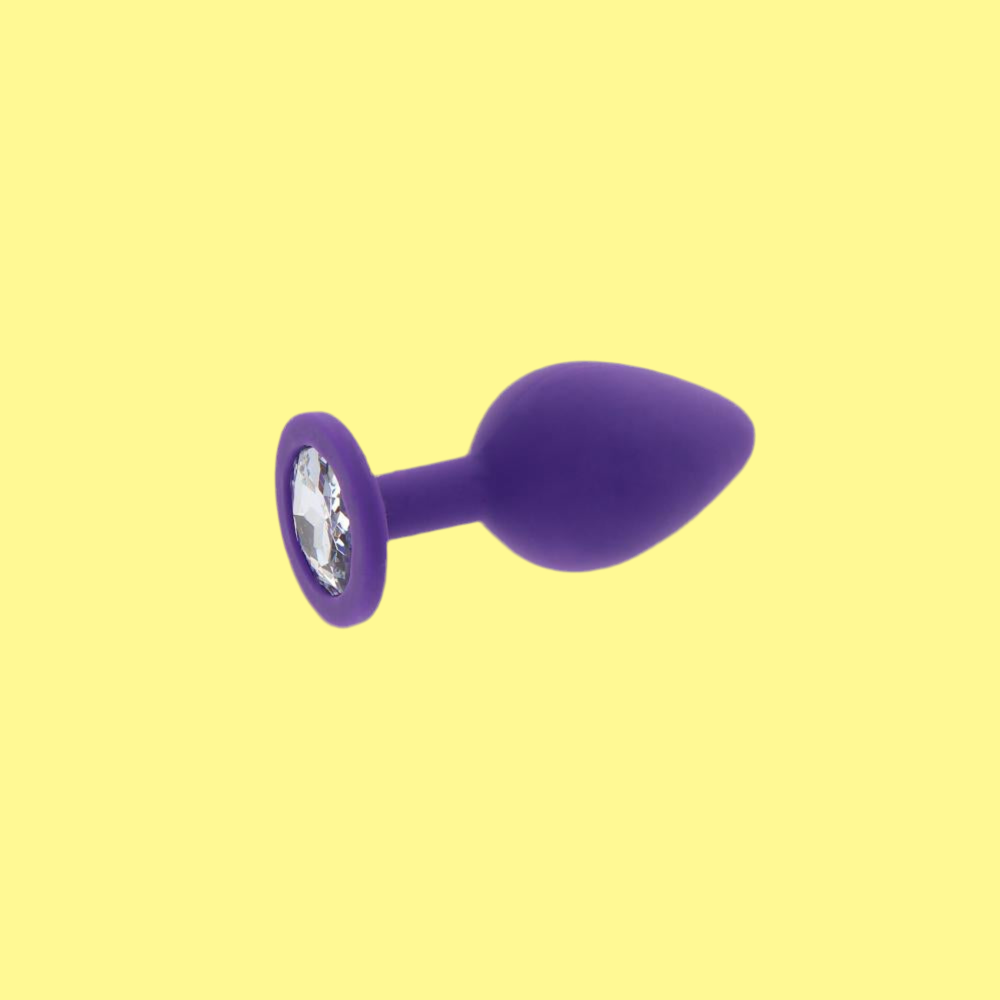 Il Plug Intense Shelki di taglia L in silicone viola vellutato e` pensato per chi ama giocare... a fondo. Morbido al tatto e deciso nella forma, questo plug regala una stimolazione piena e appagante, perfetta per chi, di esperienza, ne ha gia` almeno un po'. 