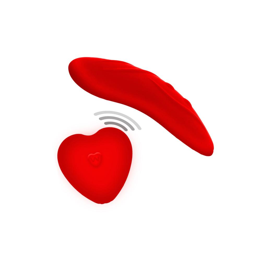 Uno slip sexy e regolabile che nasconde un ovetto vibrante, con un telecomando a forma di cuore, pensato per scivolare nel taschino interno e restare lì, discreto e silenzioso, mentre fate qualunque cosa