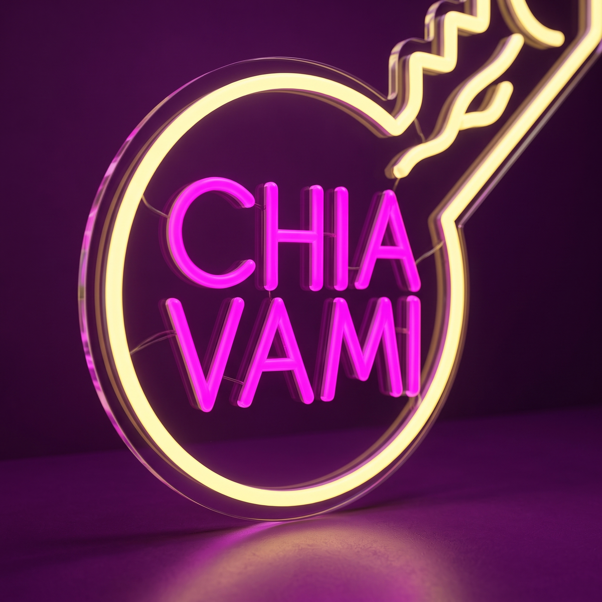 Dettaglio della scritta LED magenta CHIA VAMI nel cerchio giallo