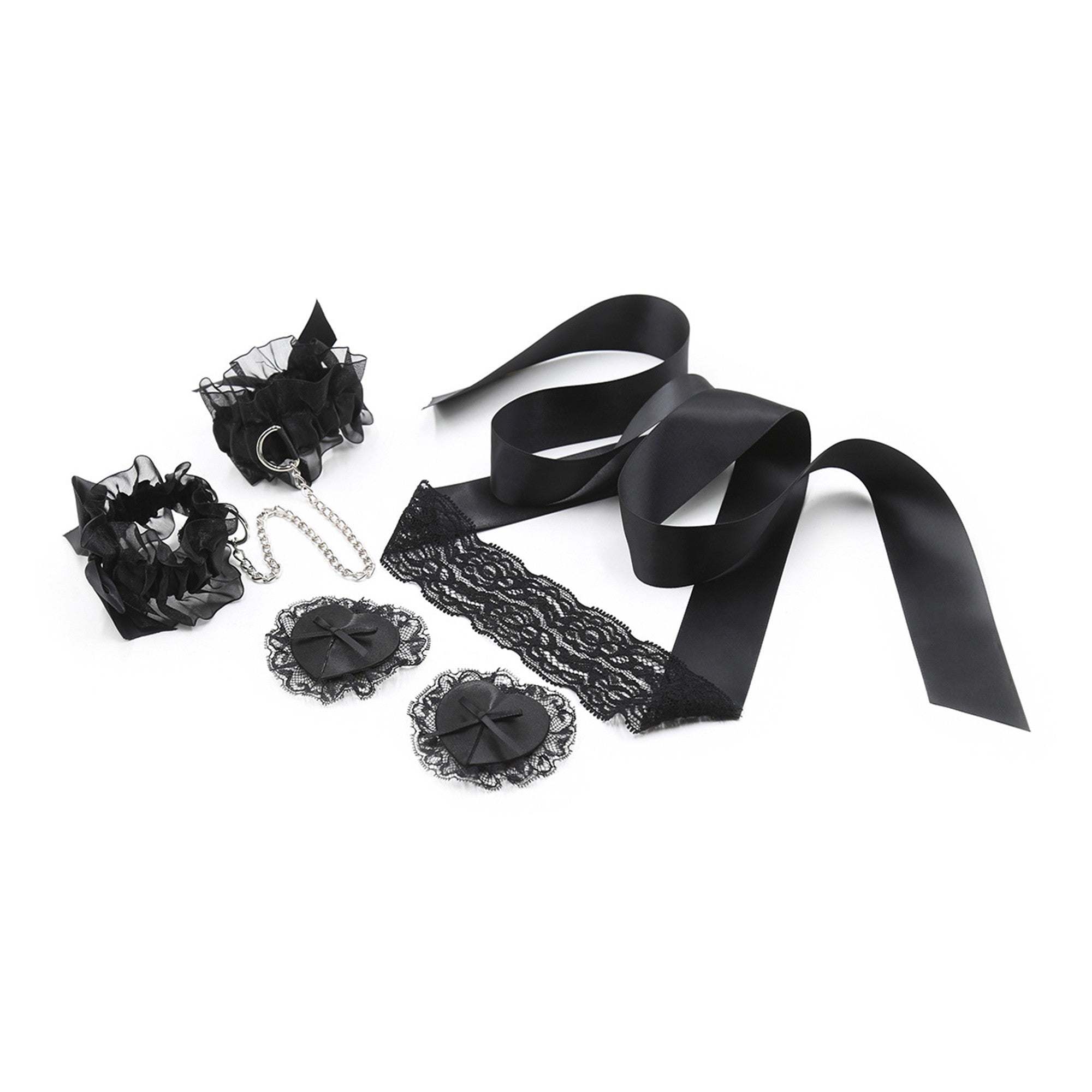 Bondage Kit 'Anastasia' - kit di accessori sexy: polsiere elastichee in raso, benda per gli occhi in pizzo e copricapezzoli riutilizzabili con decorazioni in pizzo. 